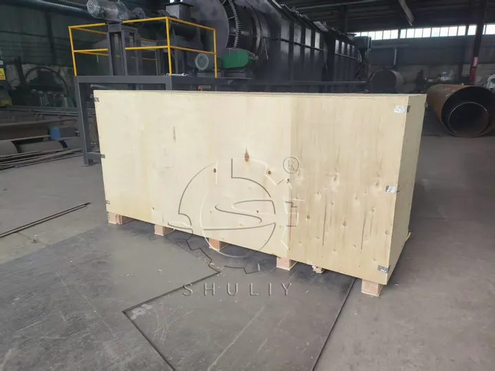 charcoal briquette machine in wooden crate